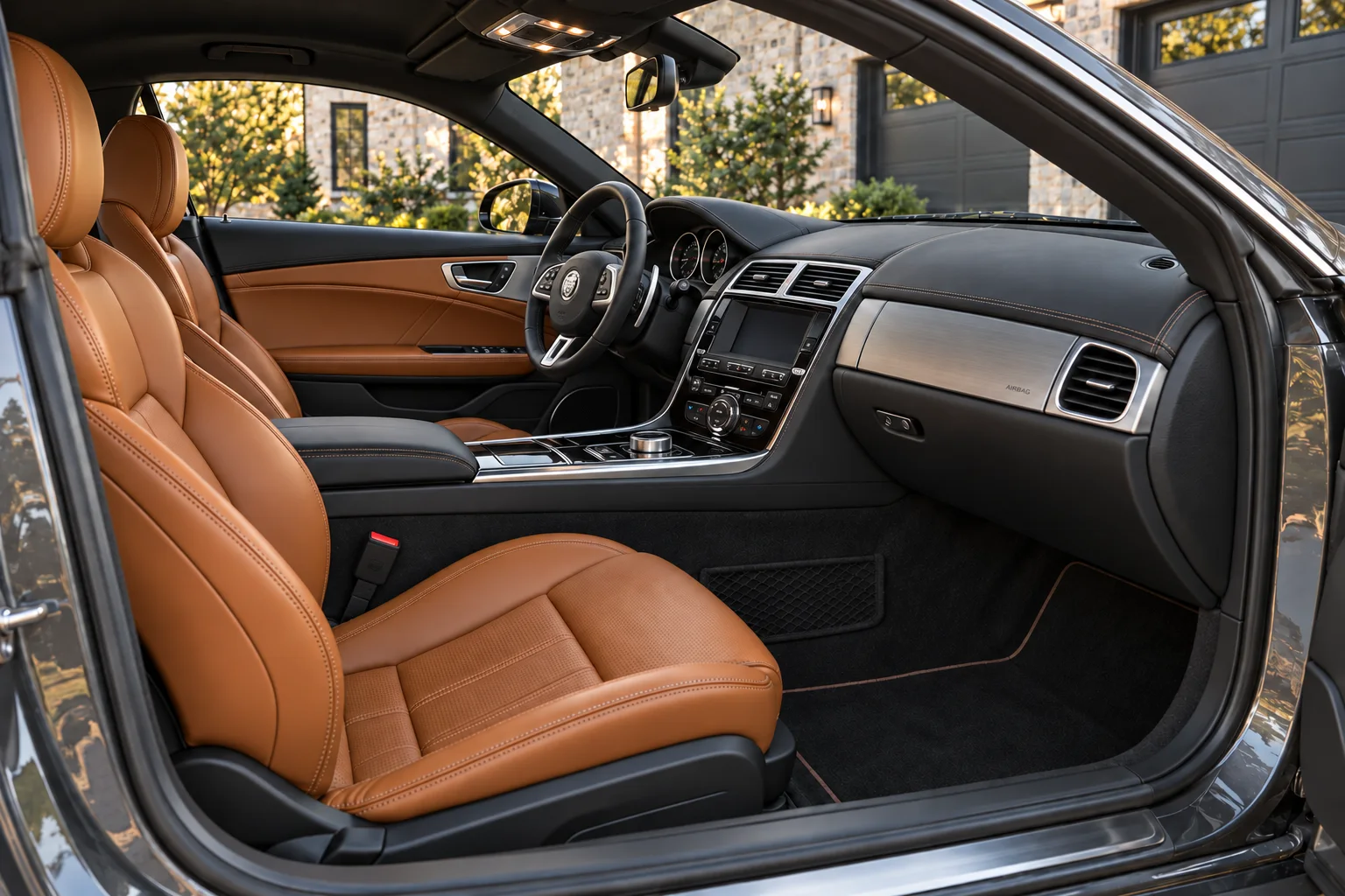 Cognac leather interior of the same graphite grand touring coupe