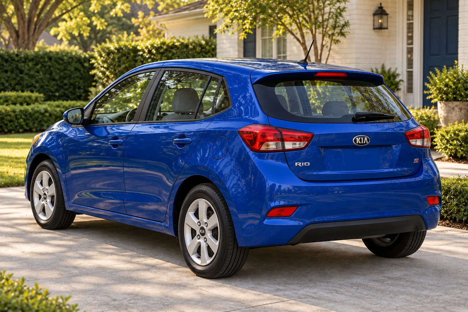 Rear exterior of the same cobalt-blue compact hatchback