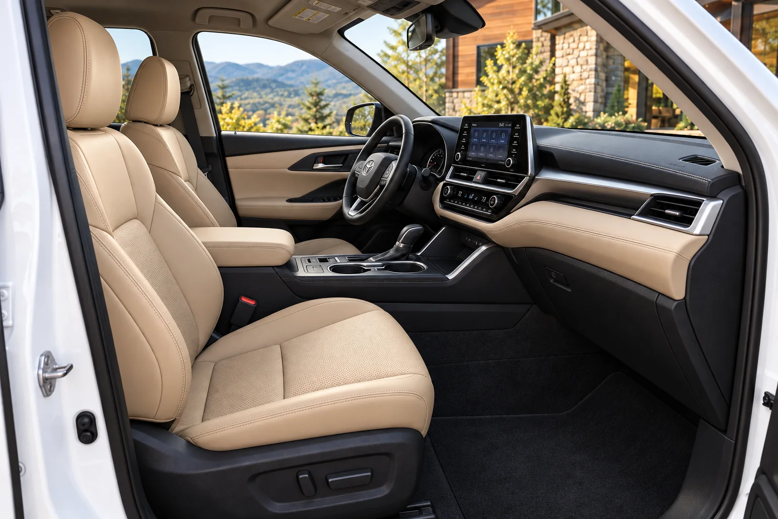 Tan leather interior of the same pearl-white SUV